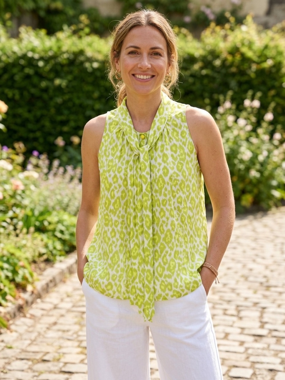 Buru Sleeveless Tie-Neck Leopard Print Top in Lime. Made in USA